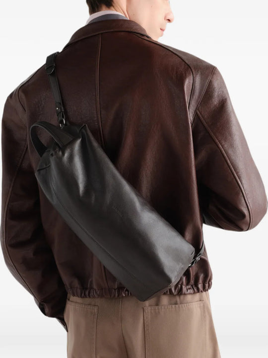 Brown bag worn by a person, showing the bag fit