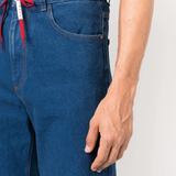 Close up of blue jeans, showing texture of the calf leather fabric