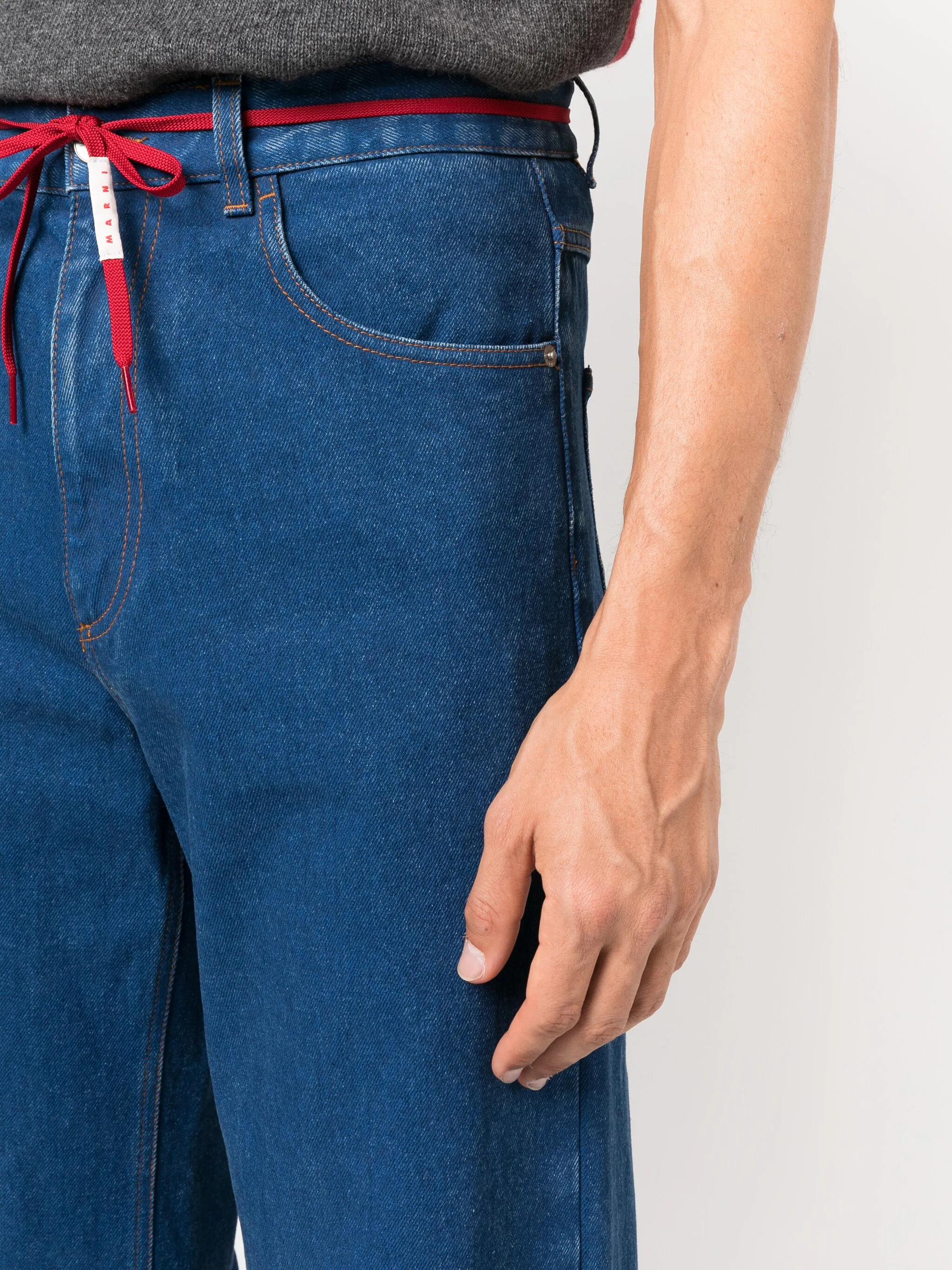 Close up of blue jeans, showing texture of the calf leather fabric