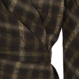 Close up of the brown jacket, showing texture of the linen and wool fabric