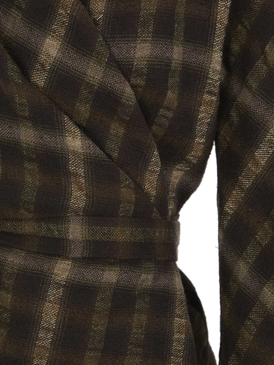 Close up of the brown jacket, showing texture of the linen and wool fabric