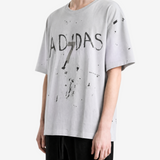 Grey t-shirt worn by a person, showing the t-shirt fit