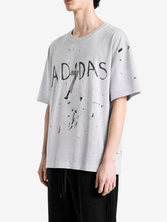 Grey t-shirt worn by a person, showing the t-shirt fit