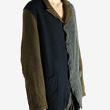 Brown jacket worn by a person. showing the jacket's fit