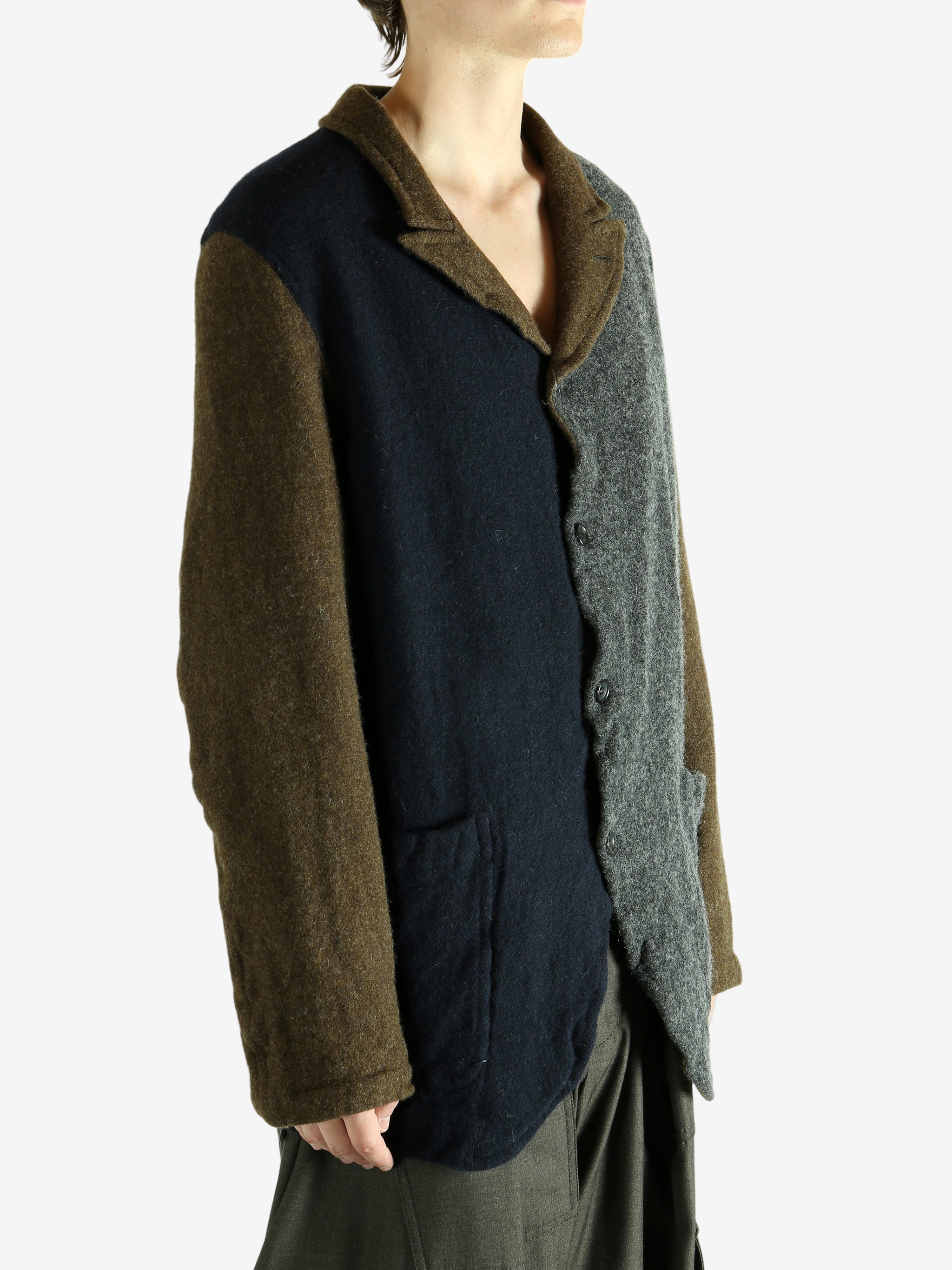 Brown jacket worn by a person. showing the jacket's fit