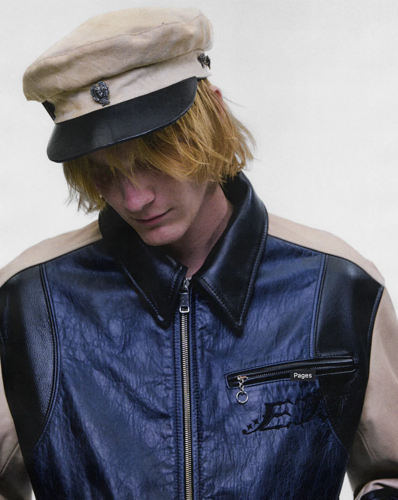 Tan hat worn by a person, showing the hat fit
