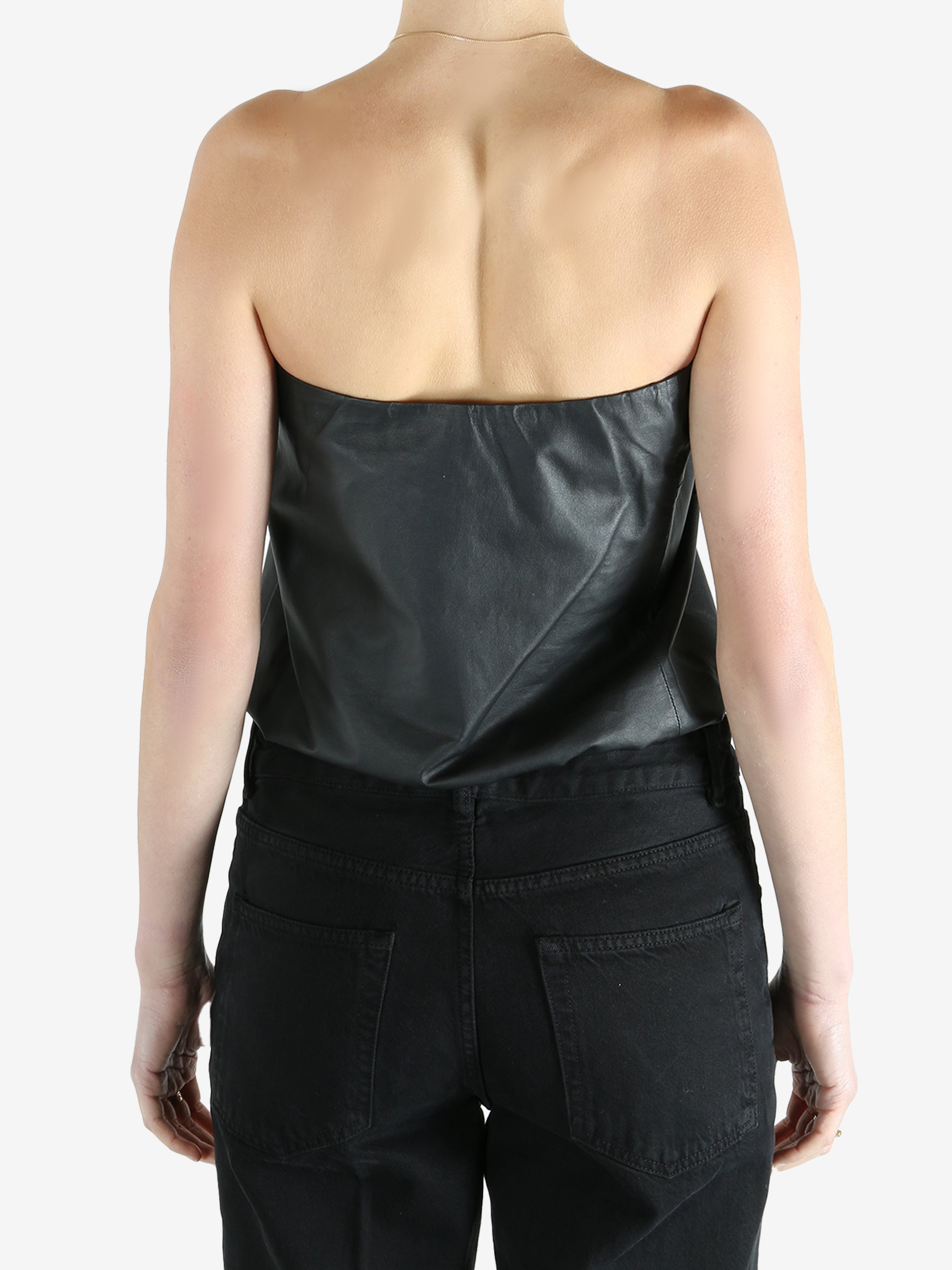 black top worn by a person, showing the top fit