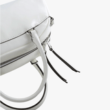 Close up of white bag, showing the detial of the zip