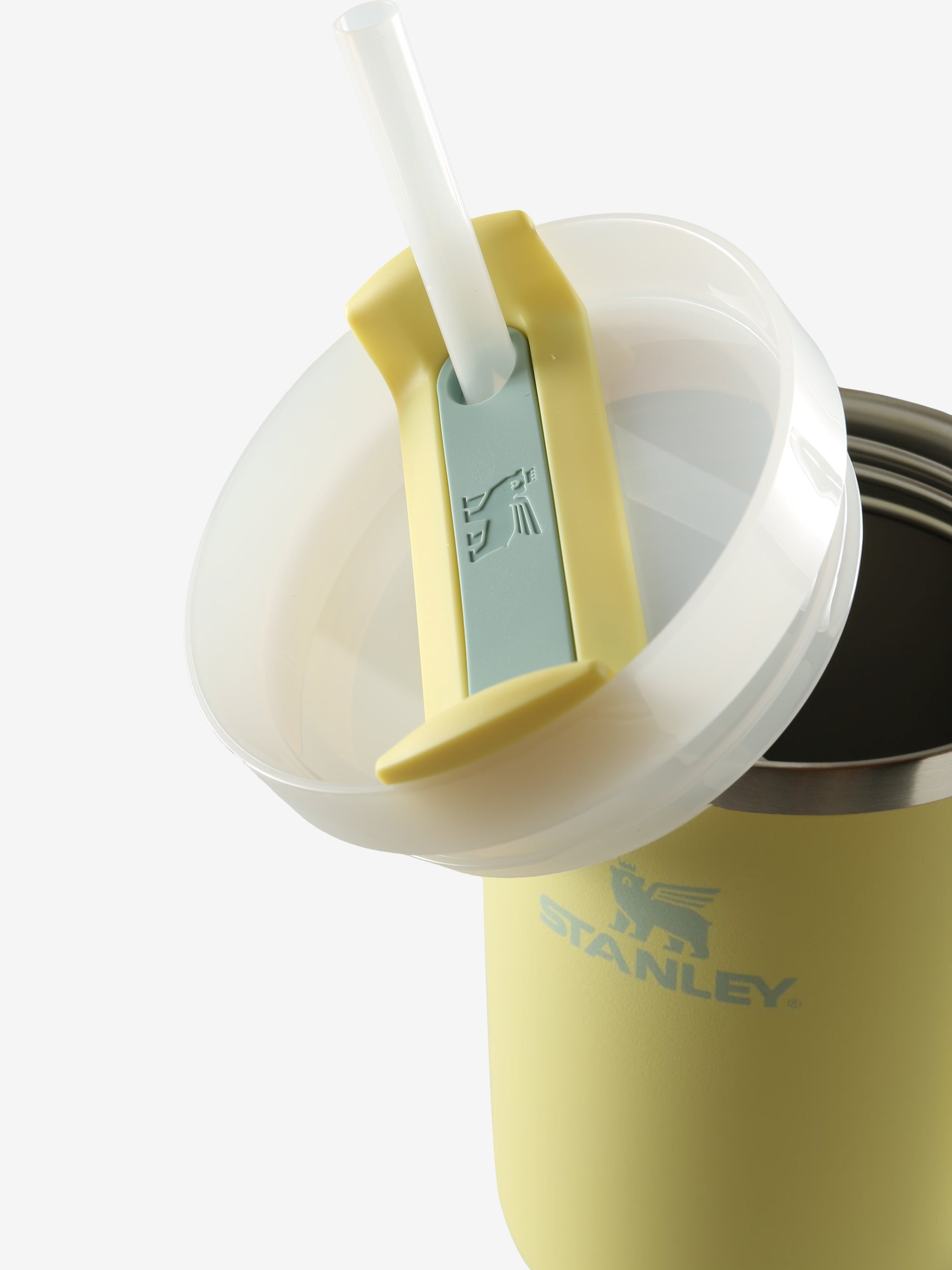 Close up of yellow tumbler, showing texture of the stainless steel fabric