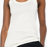 Tan top worn by a person, showing the top fit