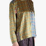 Yellow shirt worn by a person, showing the shirt's fit