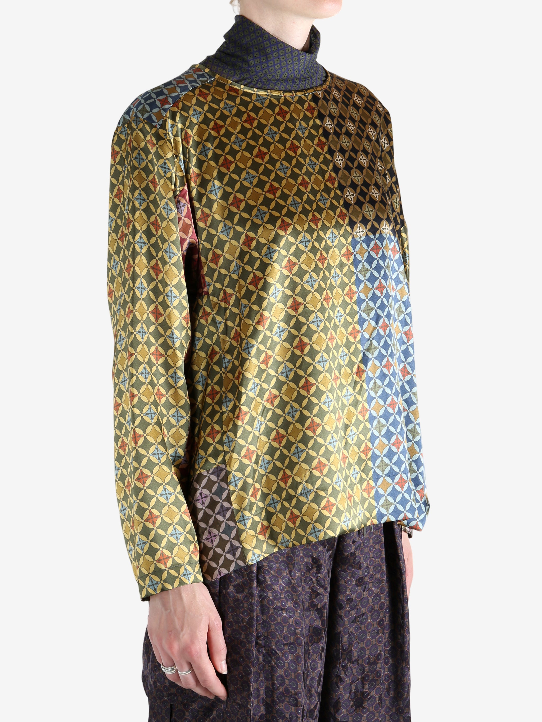 Yellow shirt worn by a person, showing the shirt's fit