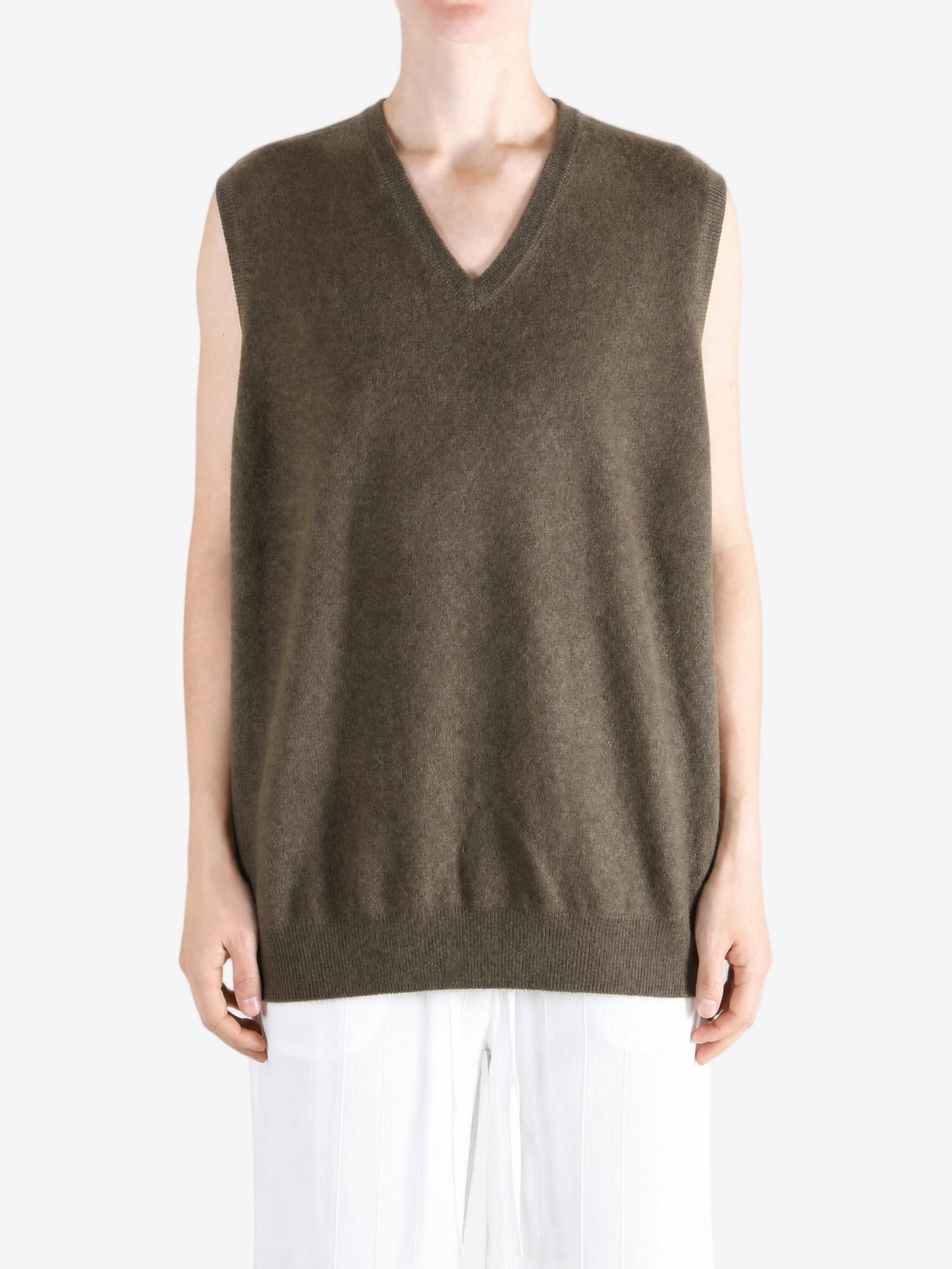 Brown hoodie worn by a person, showing the hoodie fit