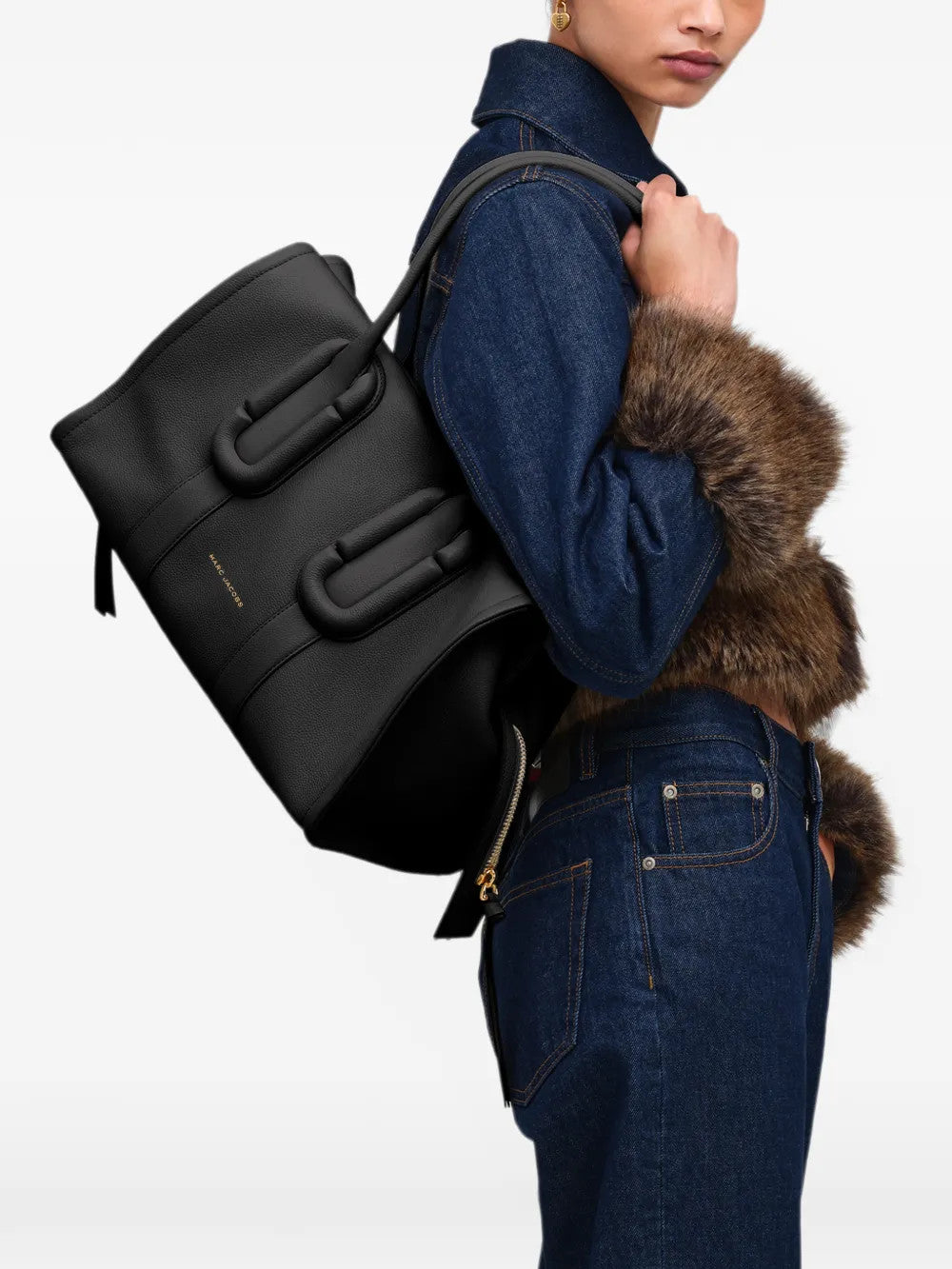 Black bag worn by a person, showing the bag fit