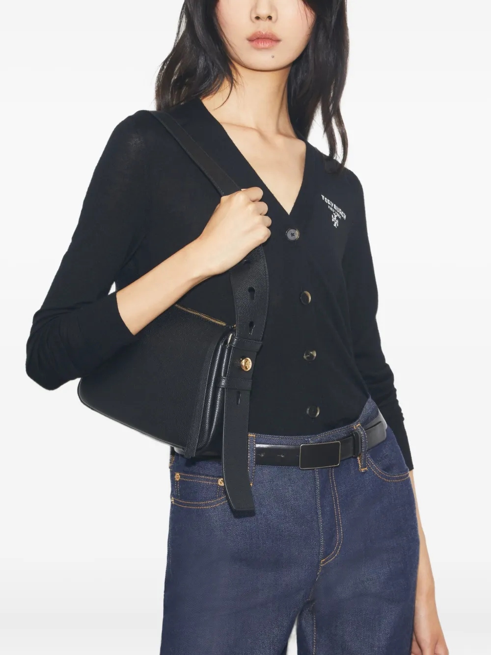 Black bag worn by a person, showing the bag's fit