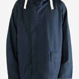 Navy jacket worn by a person, showing the jacket's fit