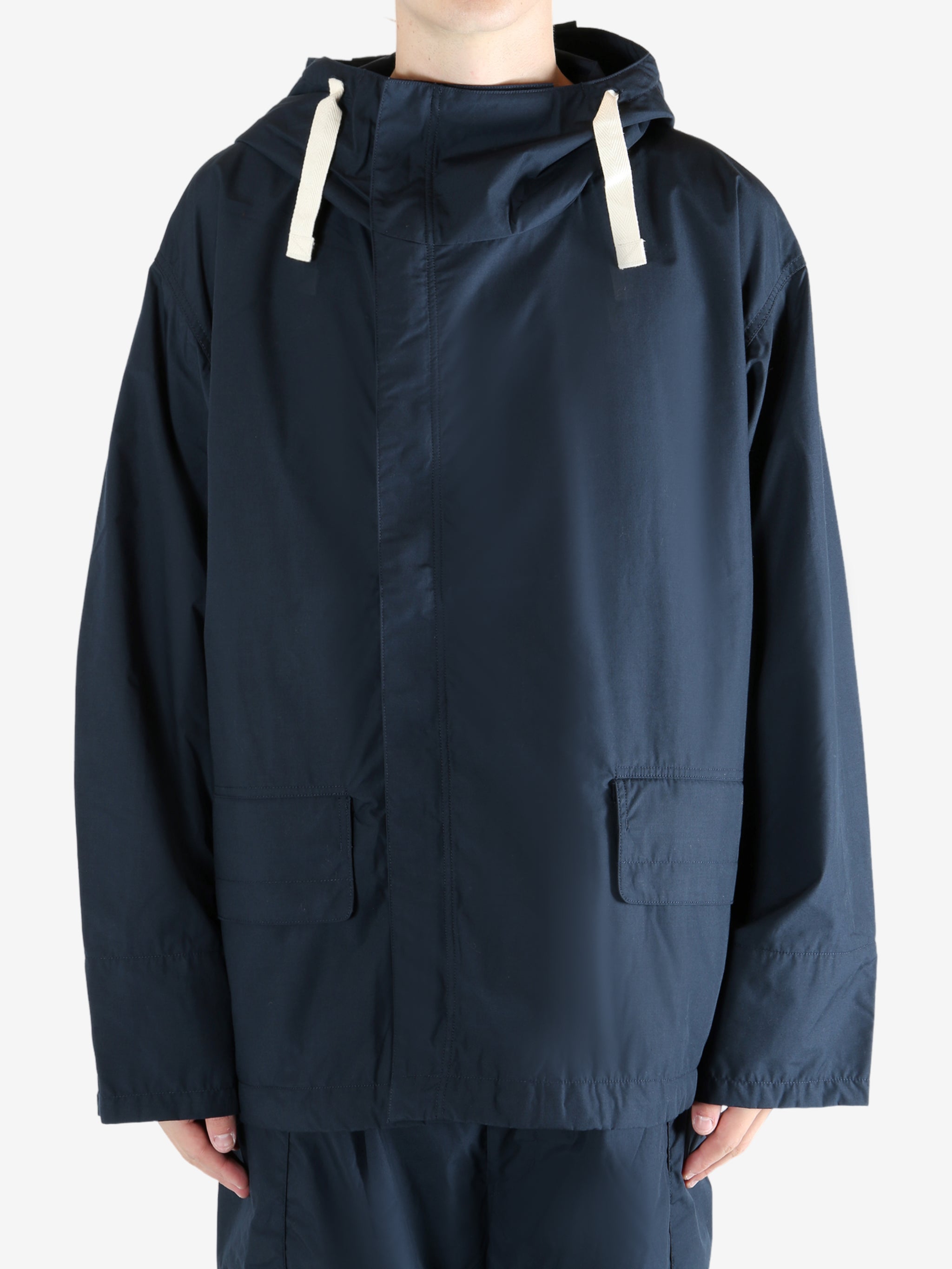 Navy jacket worn by a person, showing the jacket's fit