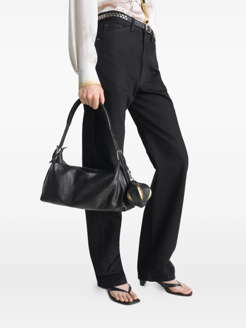 black small-accessories  worn by a person, showing the small-accessories fit