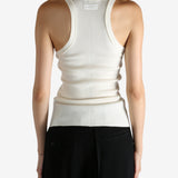 Tan top worn by a person, showing the top fit