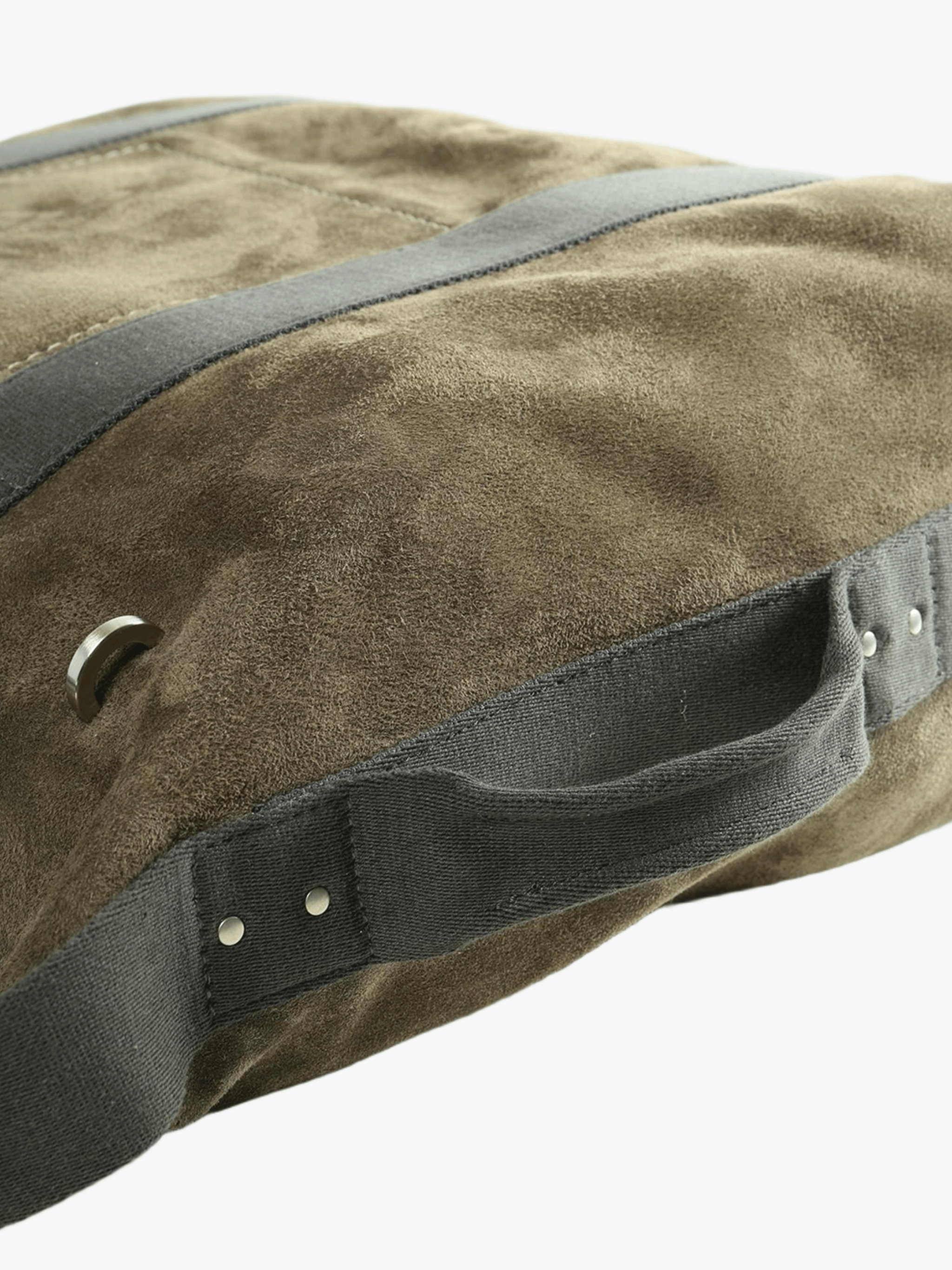 Close up of green bag, showing the texture of the leather