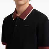 Black t-shirt worn by a person, showing the t-shirt fit