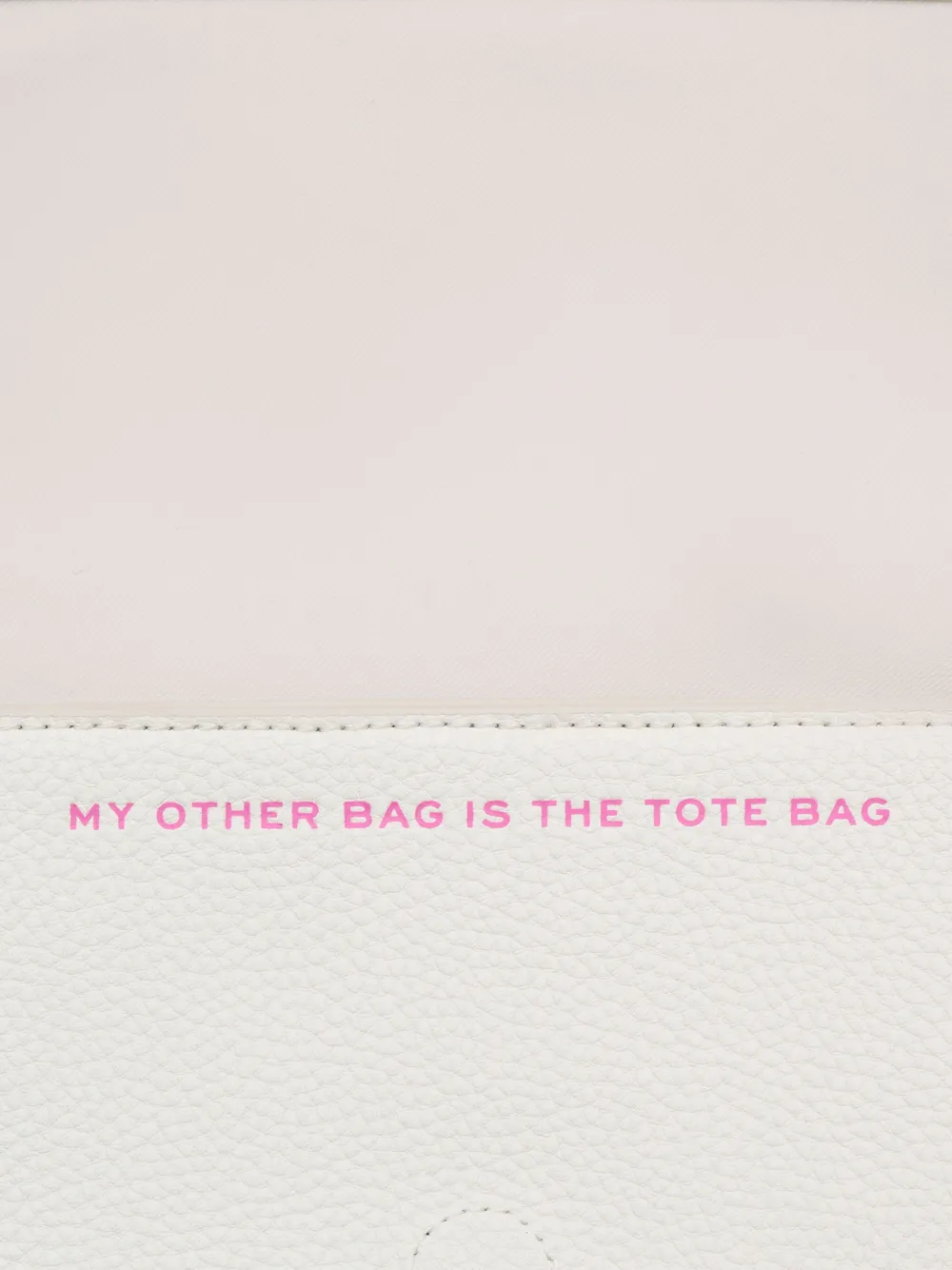 Close up of white bag,showing texture of the leather fabric