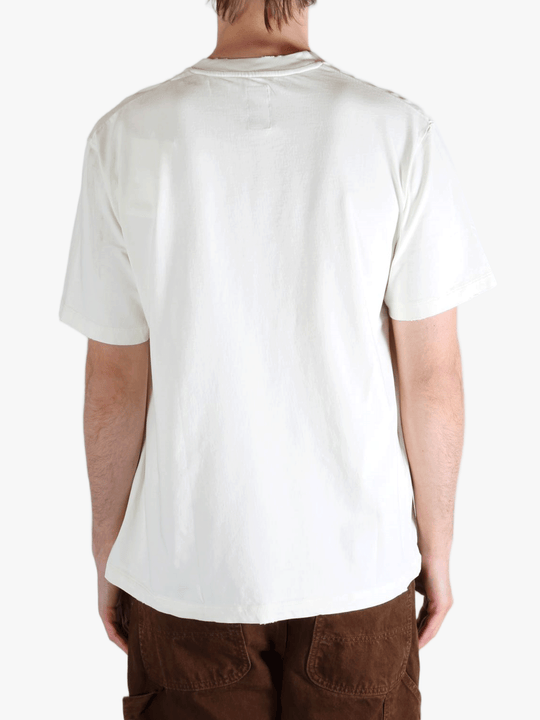 White t-shirt worn by a person, showing the t-shirt's fit