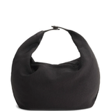 close up of brown bags, showing texture of the lamb fabric