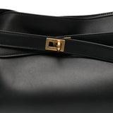 Close up of black bags, showing texture of the calf leather fabric