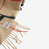 Close up of the brown scarf, showing texture of the cashmere fabric