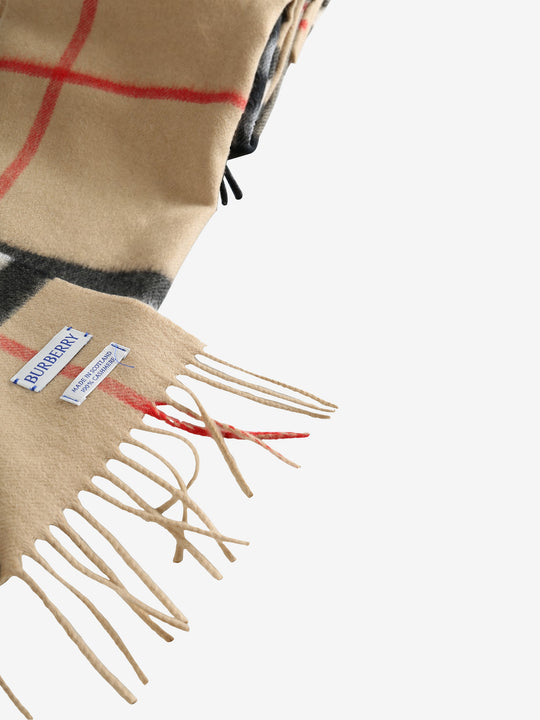 Close up of the brown scarf, showing texture of the cashmere fabric