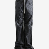 Black Pants worn by a person, showing the pants'fit