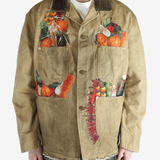 Tan jacket worn by a person, showing the jacket's fit