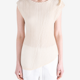 Tan shirt worn by a person, showing the shirt fit