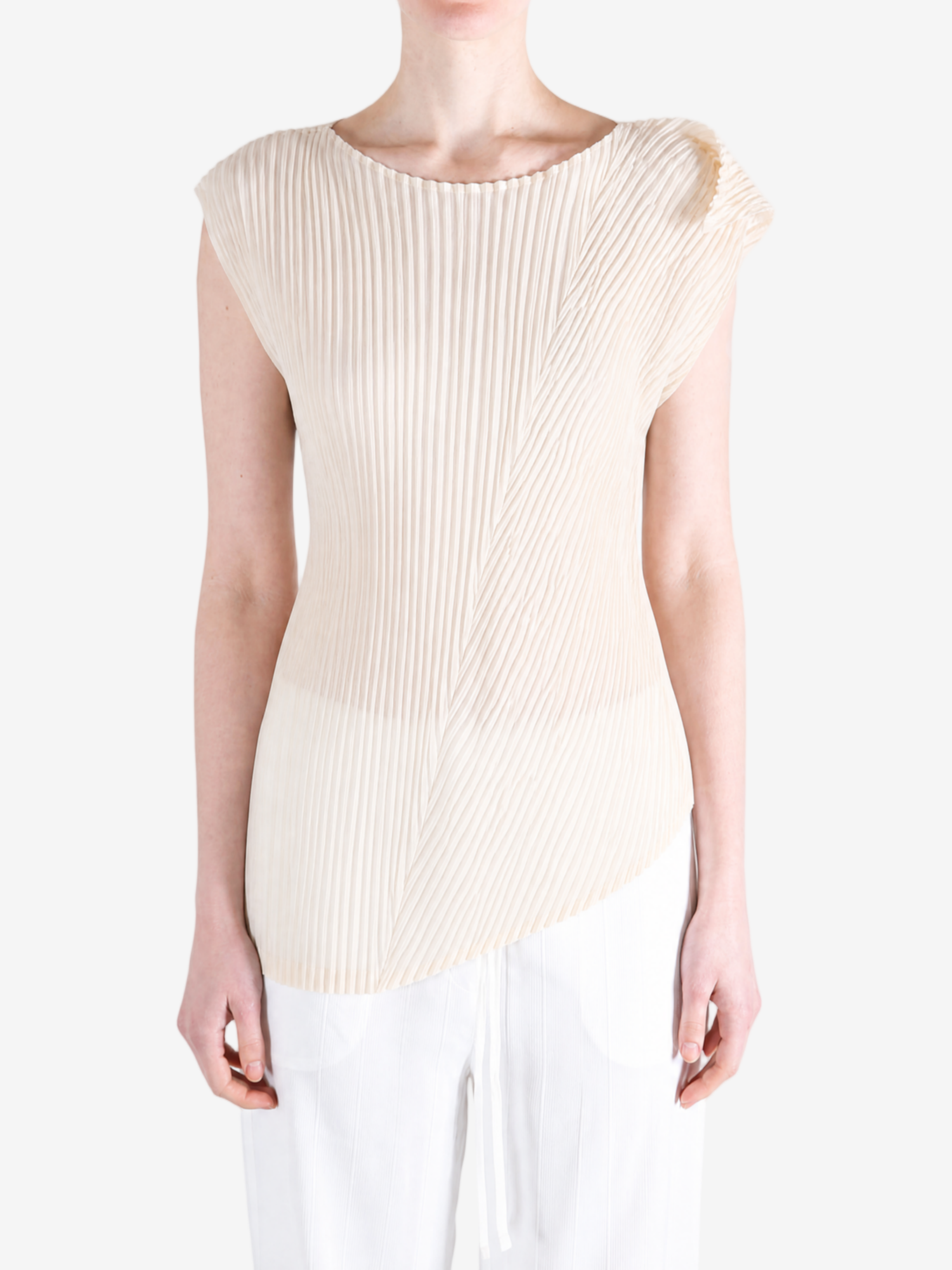Tan shirt worn by a person, showing the shirt fit