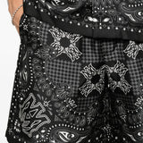 Black shorts worn by a person, showing the shorts fit