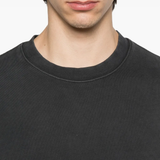 Close up of the black sweat, showing texture of the cotton fabric