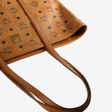 Close up of brown bag  showing texture of the leather fabric