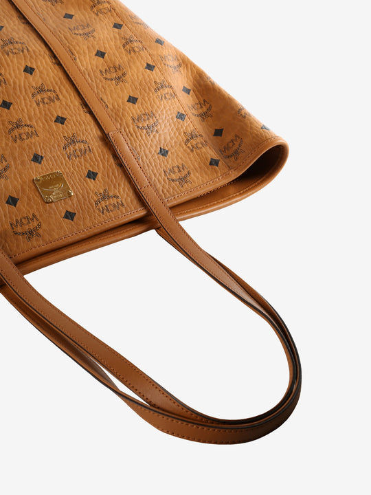 Close up of brown bag  showing texture of the leather fabric