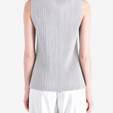 Grey shirt worn by a person, showing the shirt fit