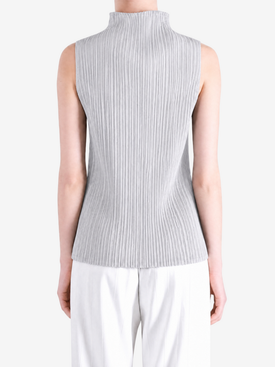 Grey shirt worn by a person, showing the shirt fit
