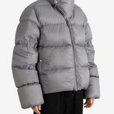 Grey jacket worn by a person, showing the jacket fit