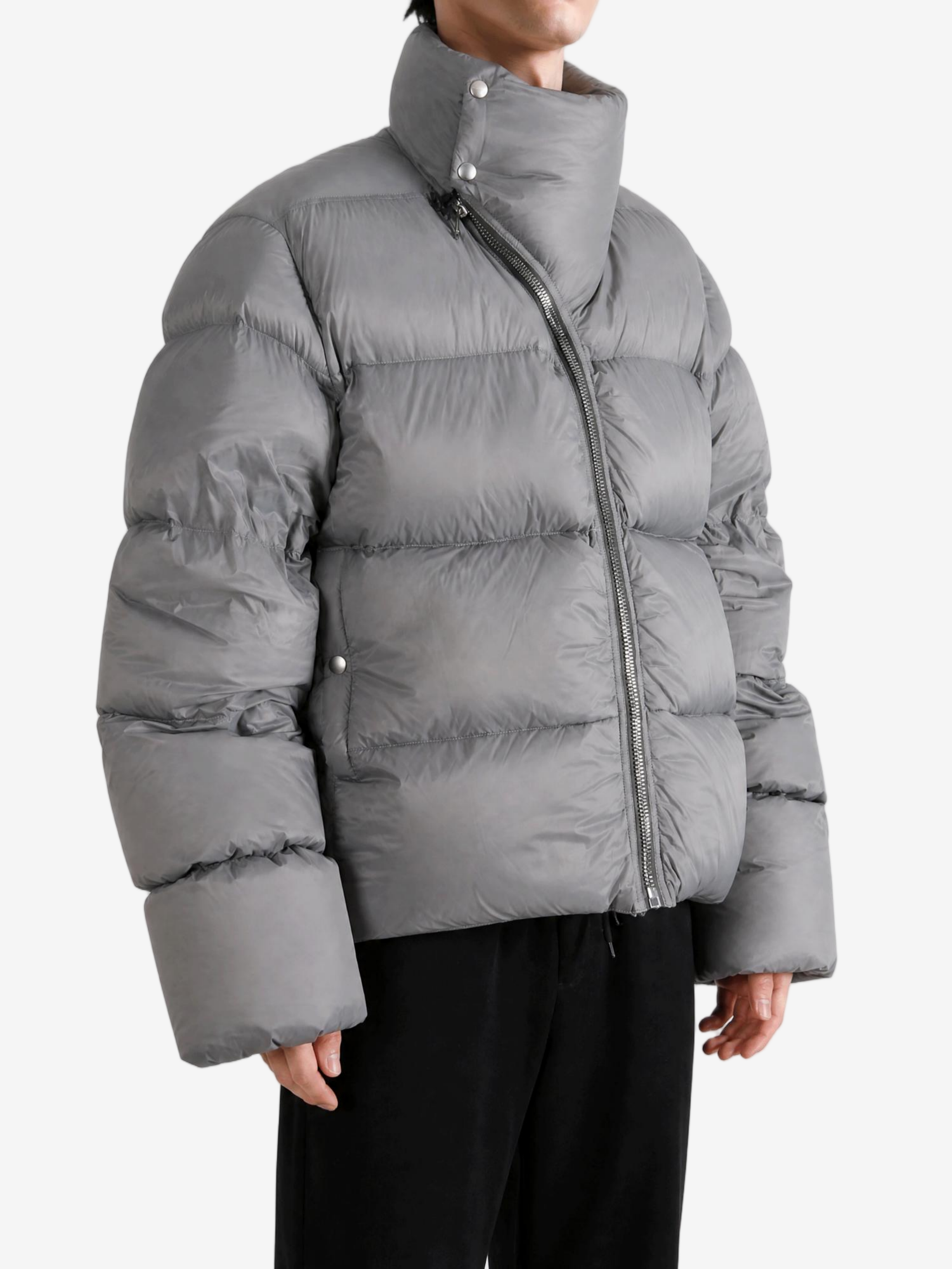 Grey jacket worn by a person, showing the jacket fit