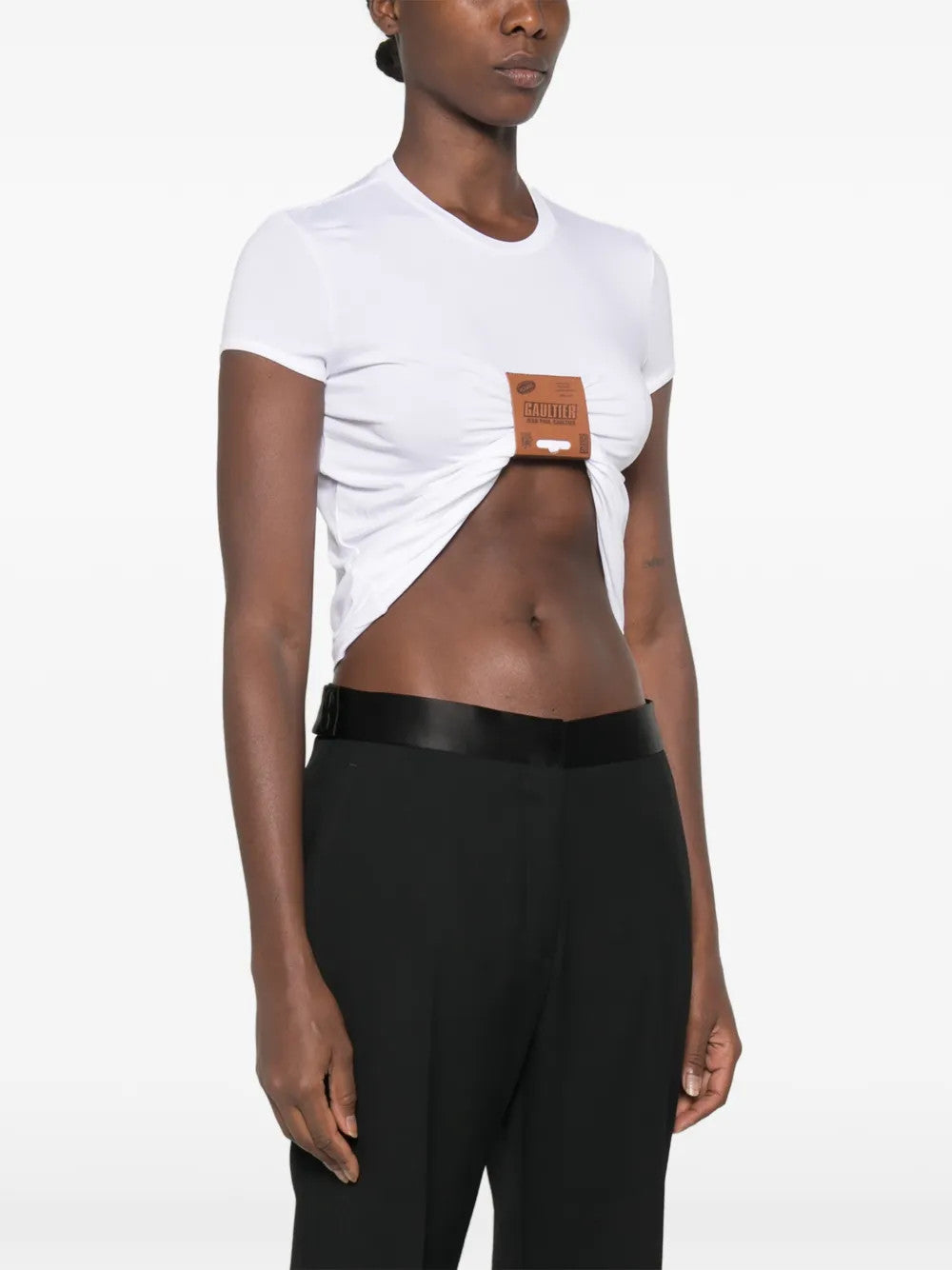 White t-shirt worn by a person, showing the t-shirt fit