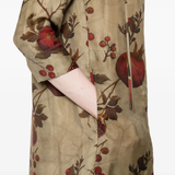 Close up of the tan dress, showing texture of the viscose and cupro fabric