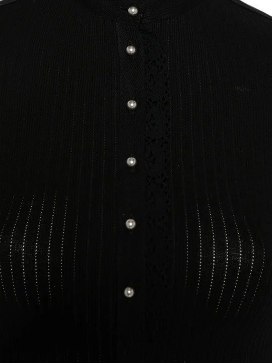 Close up of Black top, showing texture of the 100% cotton fabric