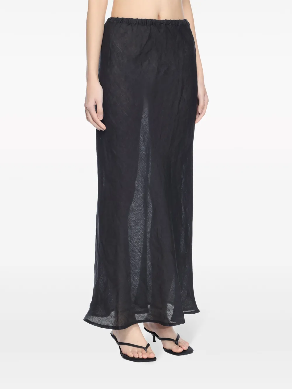 Black skirt worn by a person, showing the skirt's fit