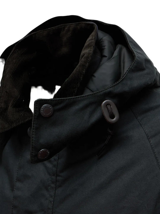 Close up of Black jacket, showing texture of the corduroy fabric