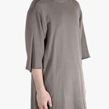 Tan t-shirts worn by a person, showing the t-shirts fit