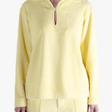 Yellow shirt worn by a person, showing the shirt's fit